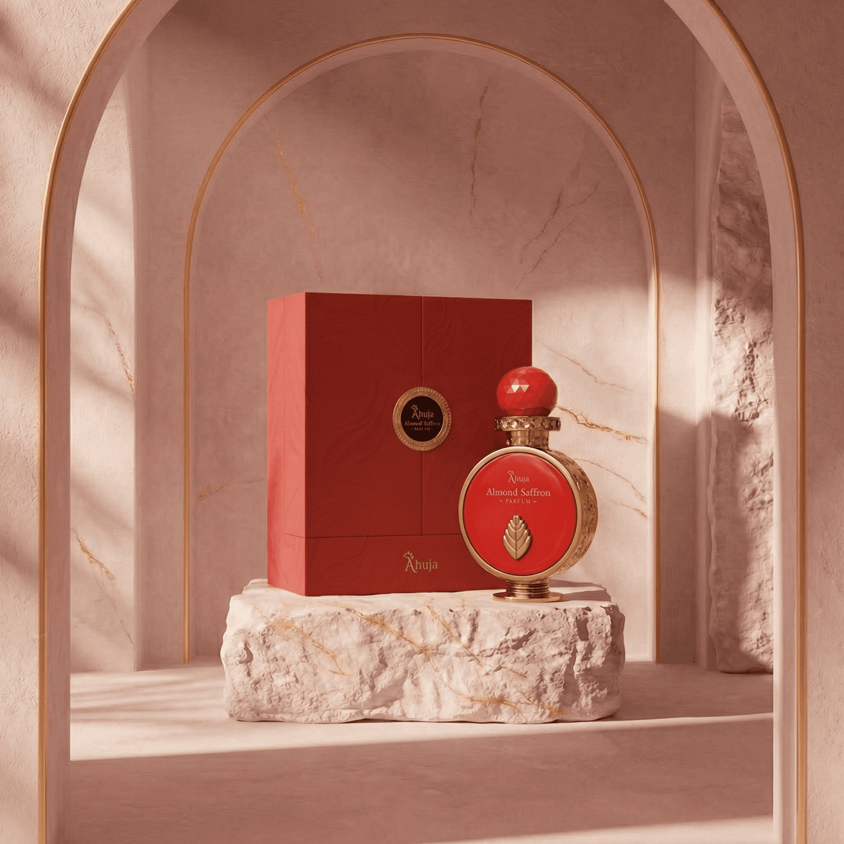 Almond Saffron by Ahuja, 100ml Parfum — bottle and gift box on stone pedestal