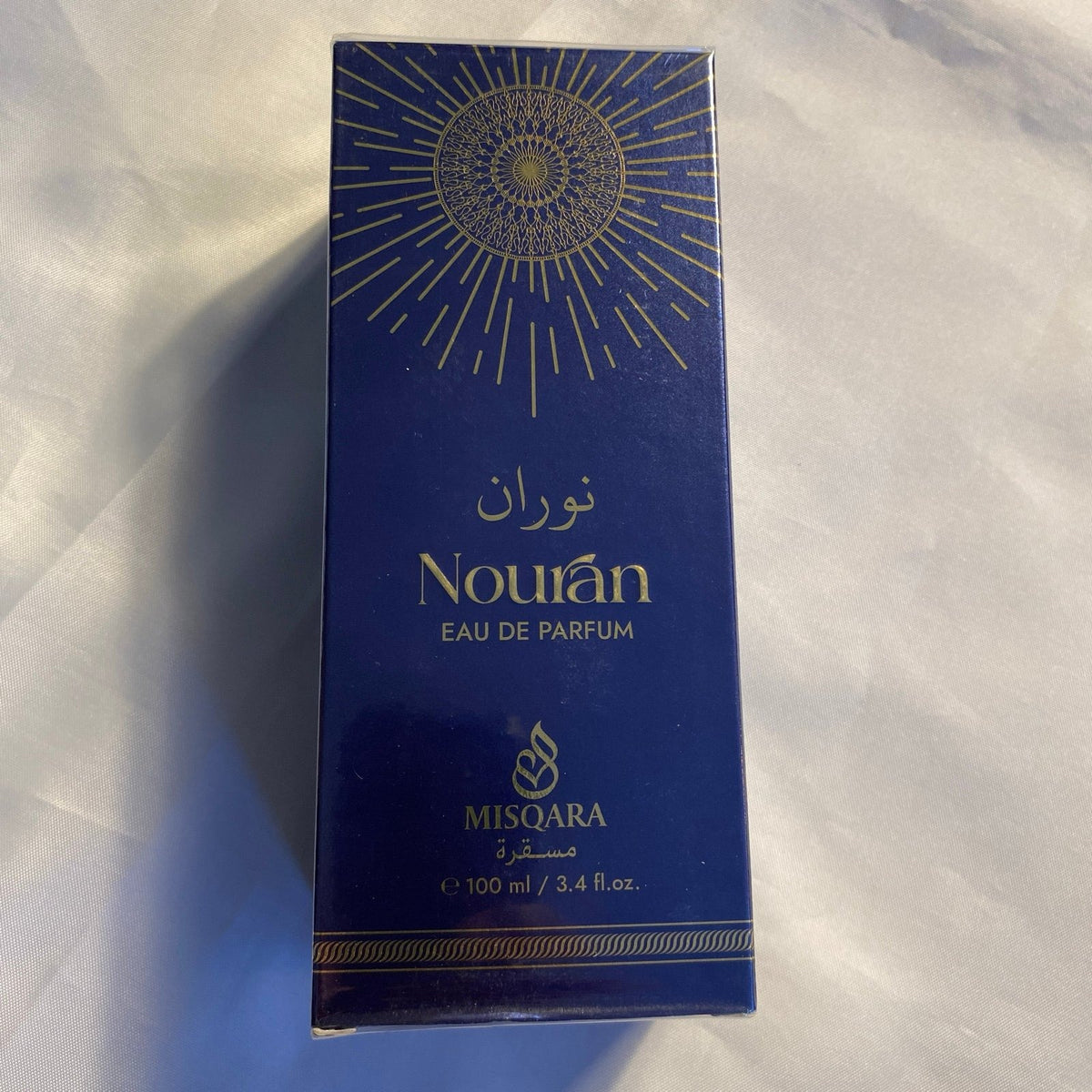 Nouran by Misqara 100ml Eau de Parfum box front with gold sunburst