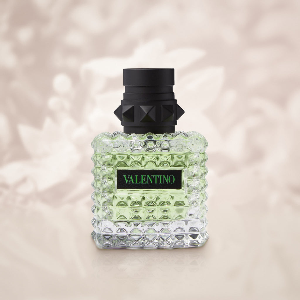 Valentino Born in Roma Green Stravaganza 30ml bottle on a soft ivory jasmine blossom background